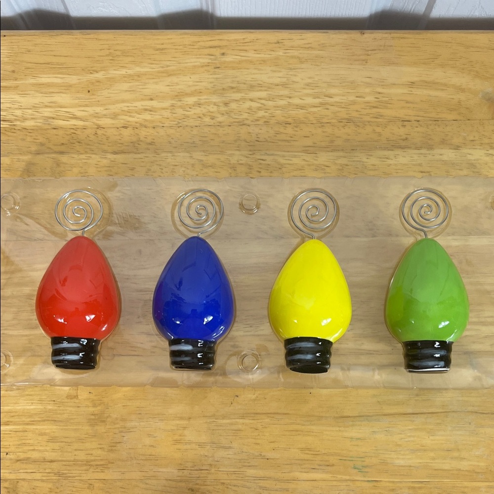 Place Card Holders. 4 Christmas light looking place card holder or food marker